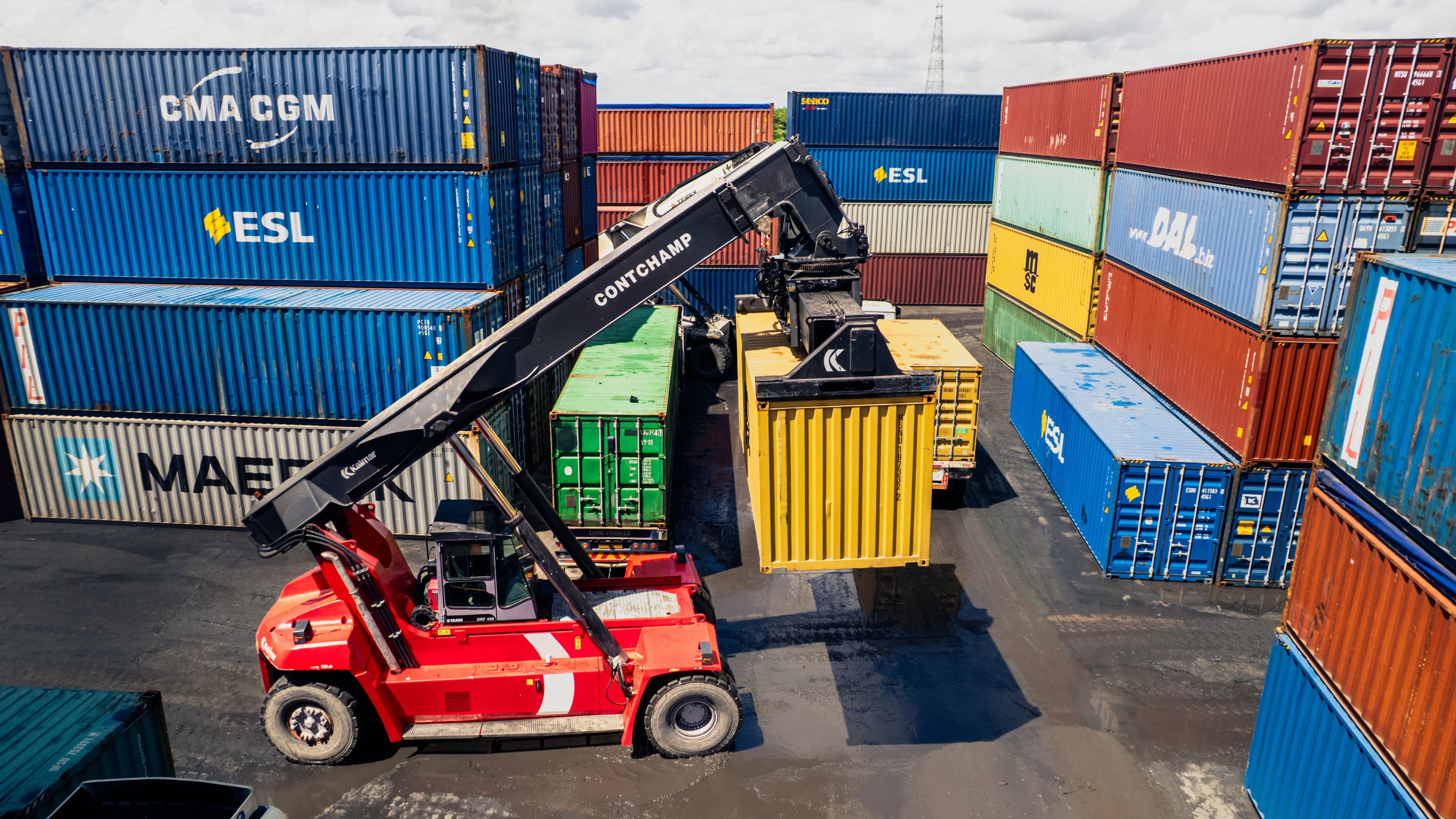 Container handling operation with stacked cargo units